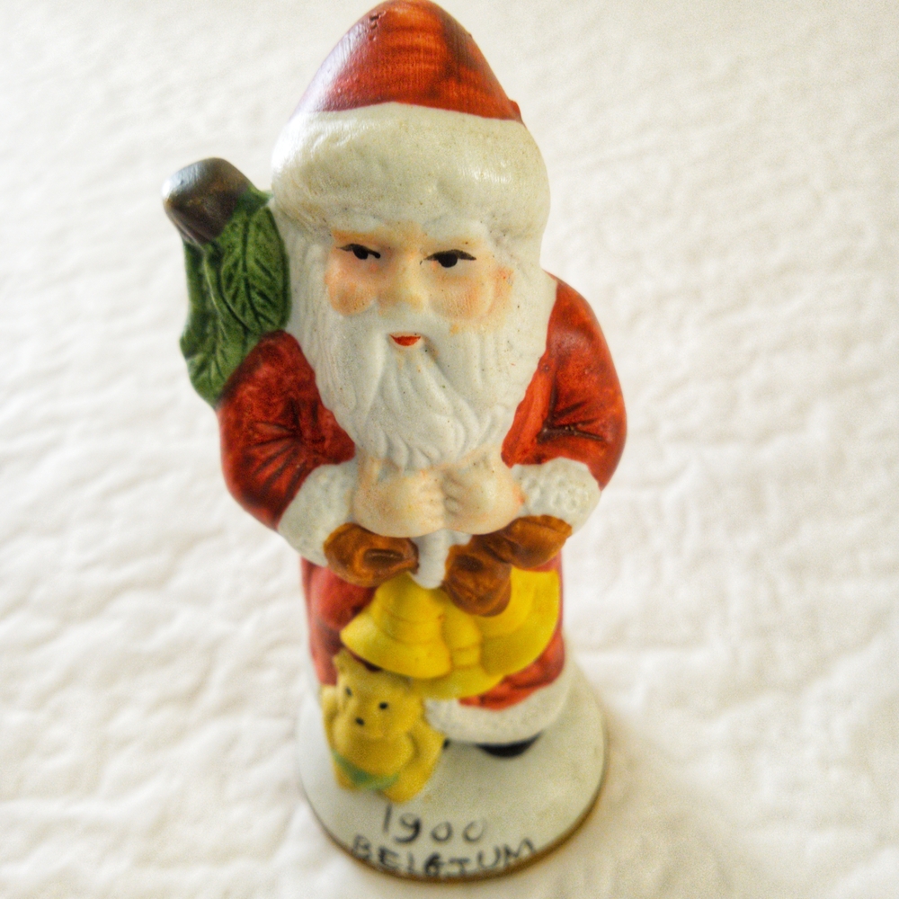 Vintage Santa Claus Figurine with Red and Green Accents